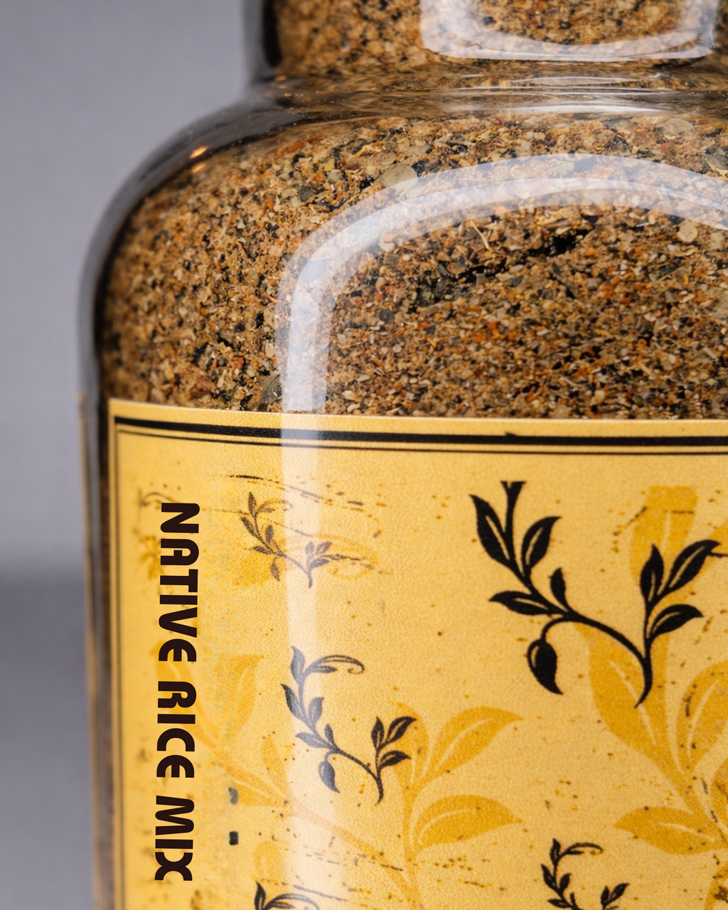 Bottle of Native Rice Mix with a yellow label on a white background