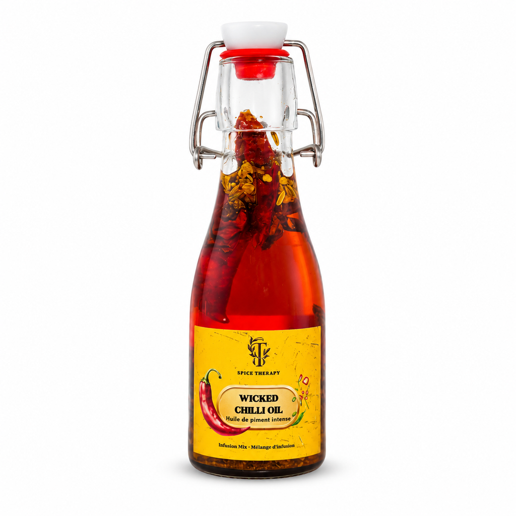 Bottle of Wicked Chilli Oil with a yellow label on a white background